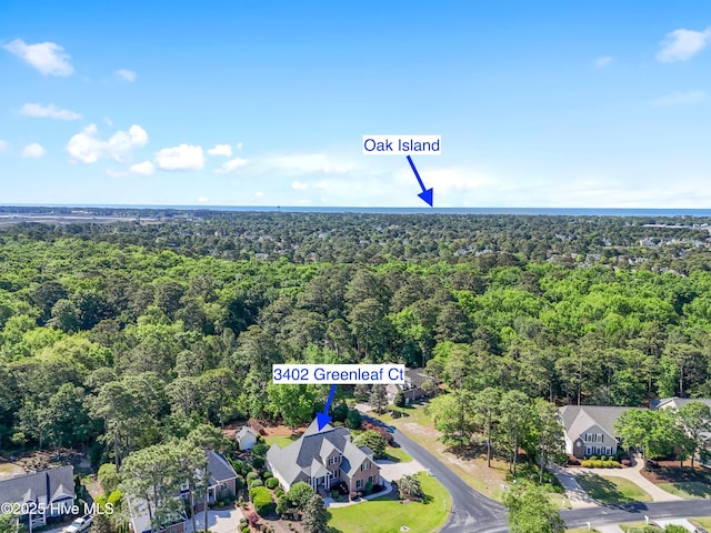 drone / aerial view of a heavily wooded area