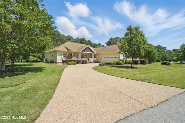 127 Meherrin River Dr, Hertford, NC 27944 - view of front of property featuring covered porch, a garage, a front lawn, and driveway