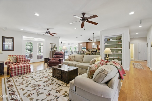 127 Meherrin River Dr, Hertford, NC 27944 - living room featuring ceiling fan, light wood-type flooring, recessed lighting, and french doors