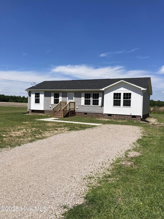 6243 NC Highway 58, Stantonsburg, NC 27883 - manufactured / mobile home with crawl space, a shingled roof, and a front yard