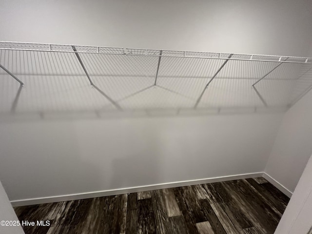 6243 NC Highway 58, Stantonsburg, NC 27883 - spacious closet featuring dark wood-style flooring
