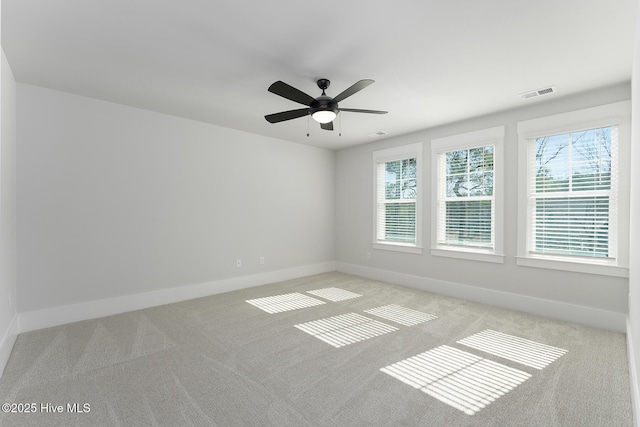 782 Hollybriar Loop Rd SE, Bolivia, NC 28422 - unfurnished room featuring carpet floors, baseboards, and ceiling fan