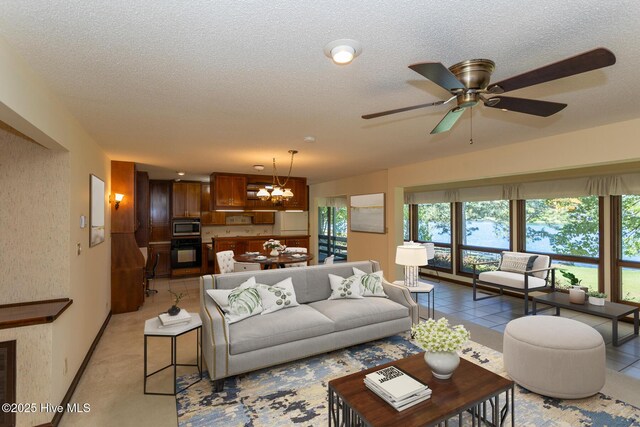 154 Overlook Dr, West End, NC 27376 - kitchen with open shelves, freestanding refrigerator, a chandelier, light colored carpet, and baseboards