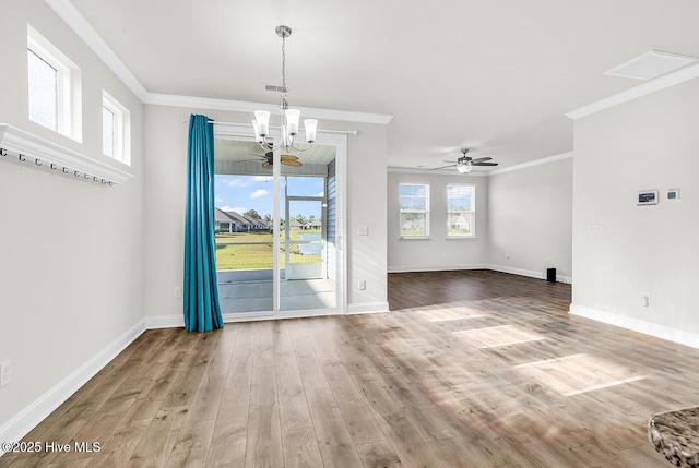 unfurnished dining area featuring ornamental molding, a chandelier, wood finished floors, and baseboards