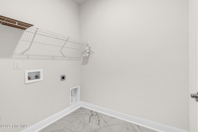washroom with electric dryer hookup, light marble finish floors, washer hookup, and baseboards