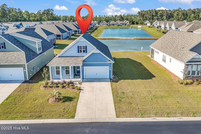 aerial view of residential area with a nearby body of water