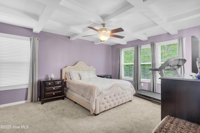 carpeted bedroom featuring coffered ceiling, beamed ceiling, baseboards, and ceiling fan