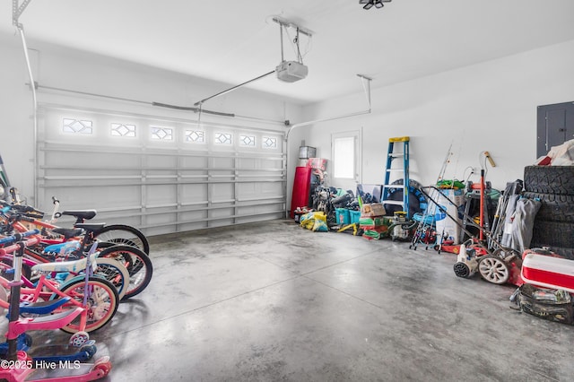 garage featuring a garage door opener
