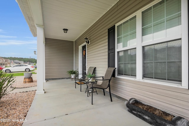 view of patio featuring a porch