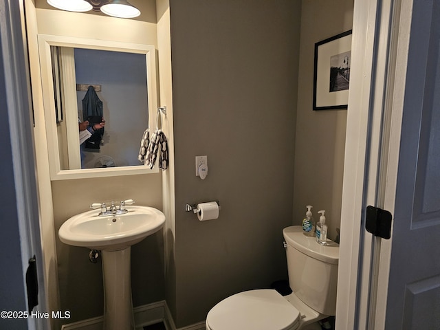 half bathroom with toilet