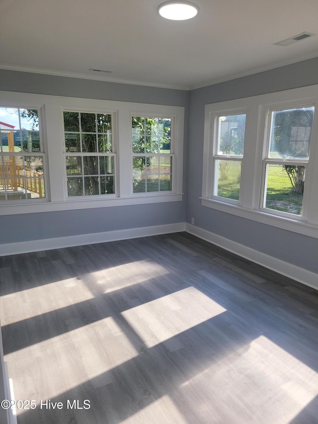 4384 Race Track Rd, Grifton, NC 28530 - unfurnished room with ornamental molding, baseboards, and dark wood-style flooring