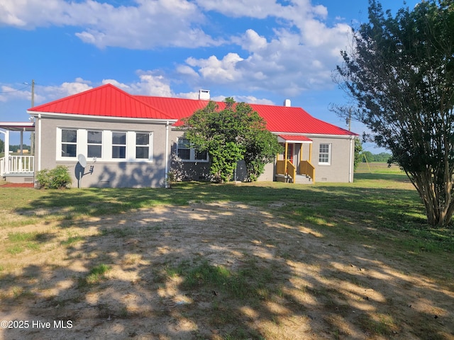 4384 Race Track Rd, Grifton, NC 28530 - back of house with metal roof, a yard, and entry steps