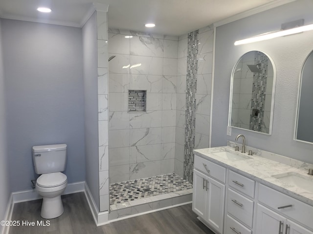 4384 Race Track Rd, Grifton, NC 28530 - full bath featuring wood finished floors, a tile shower, toilet, double vanity, and baseboards