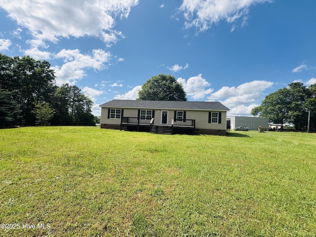 106 Haywood Country Dr, Mount Gilead, NC 27306 - manufactured / mobile home with crawl space, a deck, and a front yard