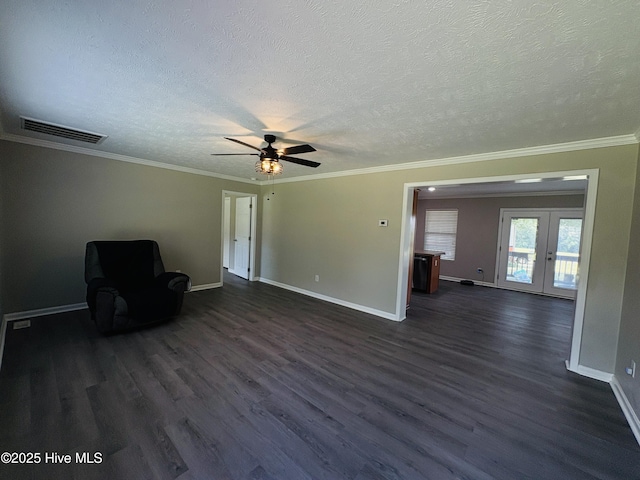 106 Haywood Country Dr, Mount Gilead, NC 27306 - unfurnished room featuring a textured ceiling, dark wood-style floors, ceiling fan, baseboards, and french doors