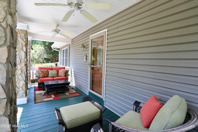wooden terrace with ceiling fan