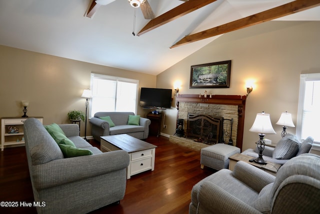 living room featuring beam ceiling, a fireplace, a ceiling fan, wood finished floors, and high vaulted ceiling