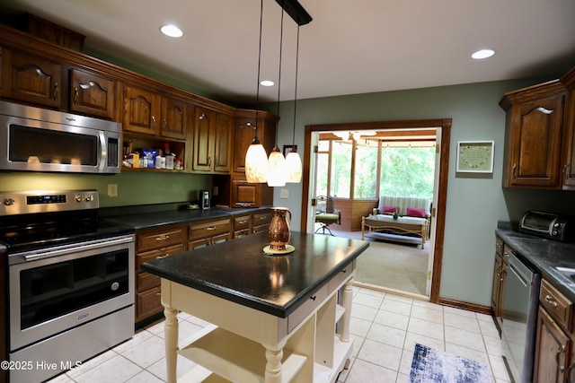 kitchen with stainless steel appliances, open shelves, dark countertops, recessed lighting, and hanging light fixtures