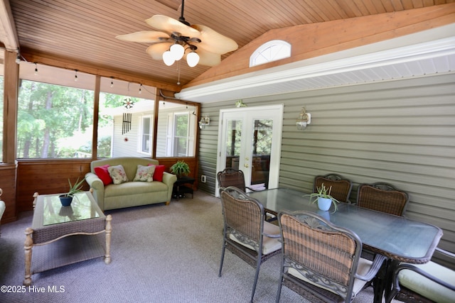 sunroom / solarium with french doors, vaulted ceiling, ceiling fan, and outdoor dining space