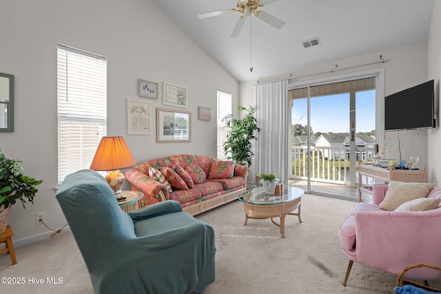 881 Great Egret Cir SW Unit 59E, Sunset Beach, NC 28468 - carpeted living area featuring ceiling fan, high vaulted ceiling, and baseboards