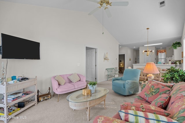 881 Great Egret Cir SW Unit 59E, Sunset Beach, NC 28468 - carpeted living room with high vaulted ceiling, a chandelier, and a ceiling fan