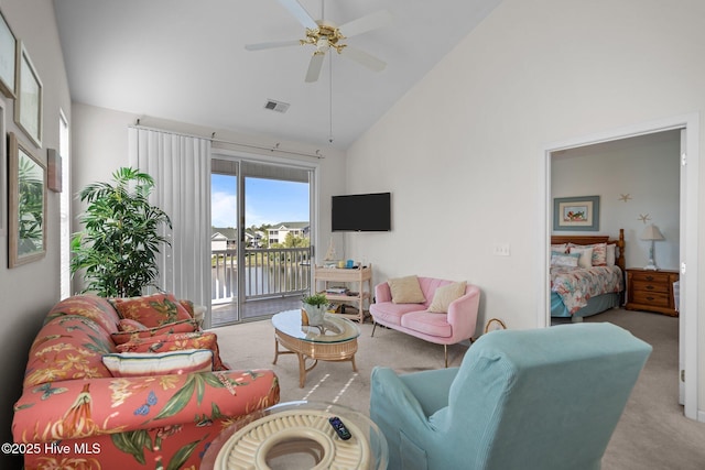 881 Great Egret Cir SW Unit 59E, Sunset Beach, NC 28468 - carpeted living room featuring high vaulted ceiling and ceiling fan
