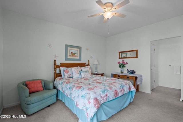 881 Great Egret Cir SW Unit 59E, Sunset Beach, NC 28468 - carpeted bedroom featuring baseboards and a ceiling fan