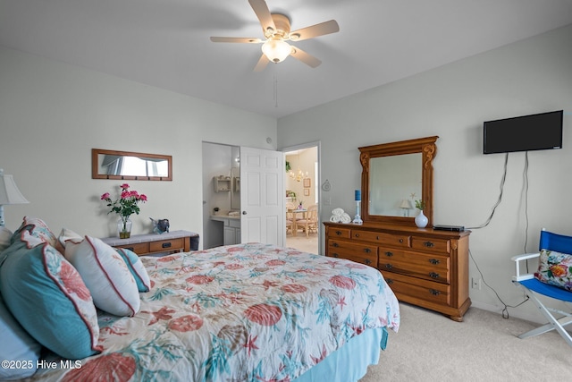 881 Great Egret Cir SW Unit 59E, Sunset Beach, NC 28468 - bedroom with light colored carpet, a ceiling fan, and baseboards
