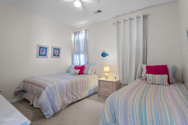 881 Great Egret Cir SW Unit 59E, Sunset Beach, NC 28468 - bedroom featuring light carpet and a ceiling fan