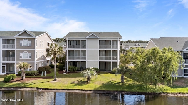 881 Great Egret Cir SW Unit 59E, Sunset Beach, NC 28468 - view of property with a water view