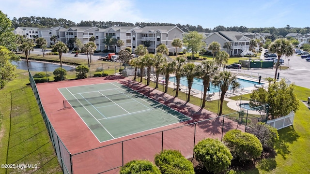 881 Great Egret Cir SW Unit 59E, Sunset Beach, NC 28468 - view of tennis court with a residential view and fence