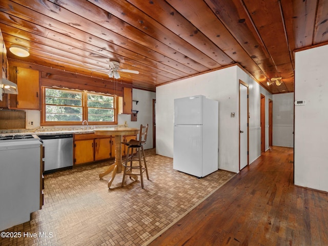 204 Cedar St, Emerald Isle, NC 28594 - kitchen with freestanding refrigerator, dishwasher, wood ceiling, light countertops, and light wood-type flooring