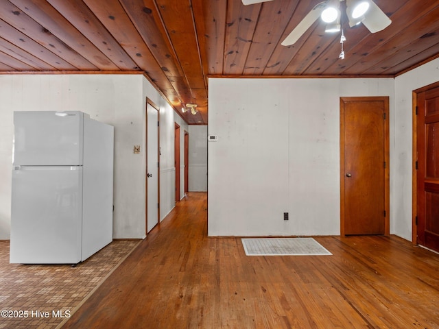 204 Cedar St, Emerald Isle, NC 28594 - spare room with wood ceiling, a ceiling fan, hardwood / wood-style floors, and crown molding