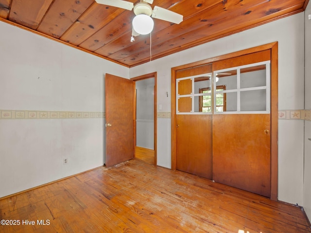 204 Cedar St, Emerald Isle, NC 28594 - unfurnished room featuring wooden ceiling, hardwood / wood-style floors, ceiling fan, and crown molding