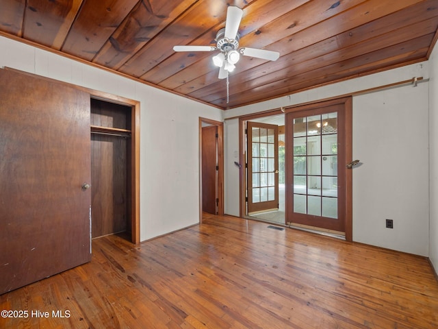 204 Cedar St, Emerald Isle, NC 28594 - unfurnished bedroom with wooden ceiling and hardwood / wood-style flooring