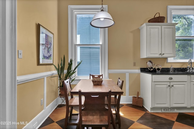 211 Ann St, Wilmington, NC 28401 - dining area with wood finished floors