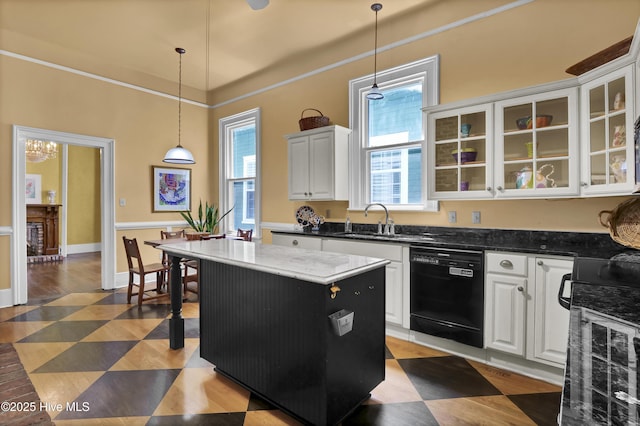 211 Ann St, Wilmington, NC 28401 - kitchen featuring dishwasher, a sink, white cabinetry, glass insert cabinets, and range