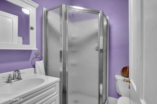 211 Ann St, Wilmington, NC 28401 - bathroom featuring vanity, toilet, and a shower stall