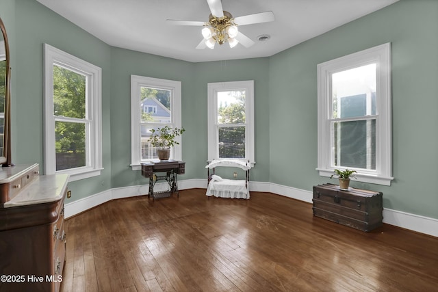 211 Ann St, Wilmington, NC 28401 - sitting room with wood-type flooring, ceiling fan, and baseboards