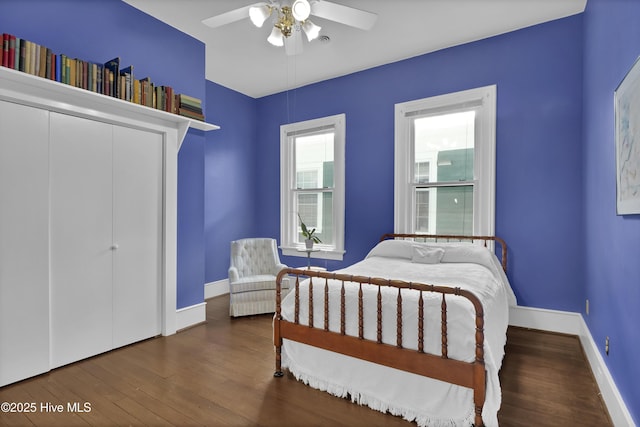211 Ann St, Wilmington, NC 28401 - bedroom with wood finished floors, baseboards, ceiling fan, and a closet