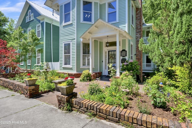 211 Ann St, Wilmington, NC 28401 - view of front of home with covered porch