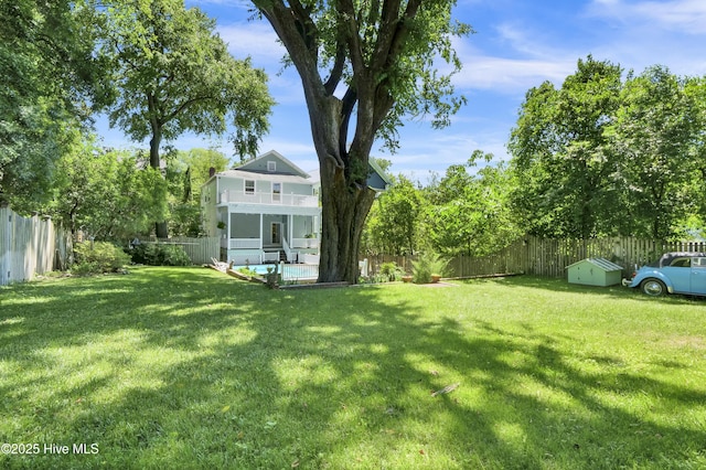 211 Ann St, Wilmington, NC 28401 - view of yard with a balcony and a sunroom