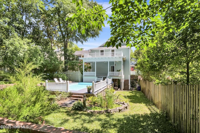 211 Ann St, Wilmington, NC 28401 - back of house with a balcony, a wooden deck, and stairway