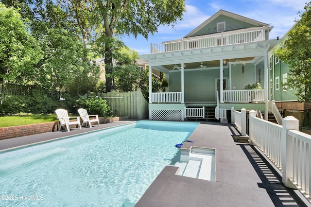 211 Ann St, Wilmington, NC 28401 - rear view of house with a ceiling fan and covered porch