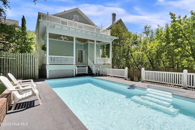 211 Ann St, Wilmington, NC 28401 - back of house featuring a ceiling fan and stairway