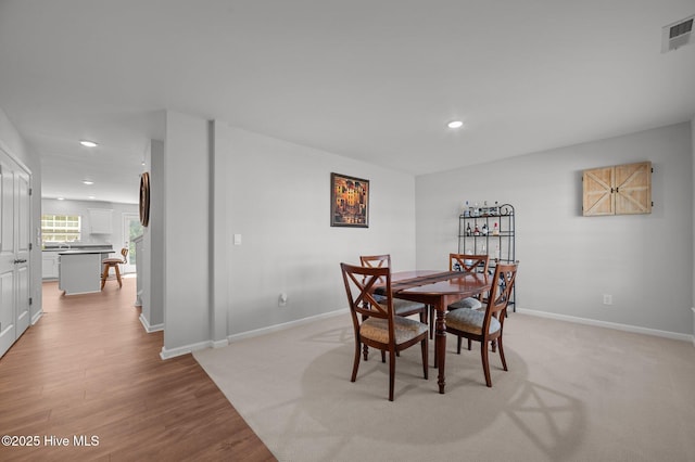 4569 Sandstone Dr, Greenville, NC 27858 - dining room featuring recessed lighting, light wood finished floors, and baseboards