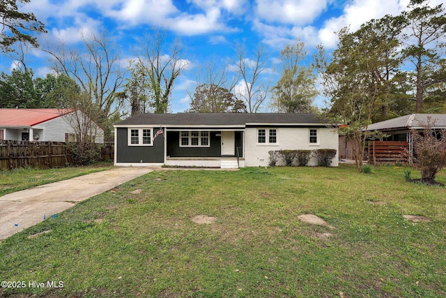 304 S Thompson St, Whiteville, NC 28472 - view of front of property featuring concrete driveway, a porch, and brick siding