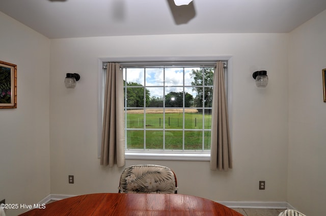 2046 Ash Little River Rd NW, Ash, NC 28420 - dining room with baseboards and ceiling fan