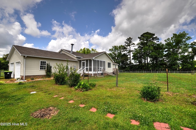 2046 Ash Little River Rd NW, Ash, NC 28420 - rear view of property with a sunroom and a garage