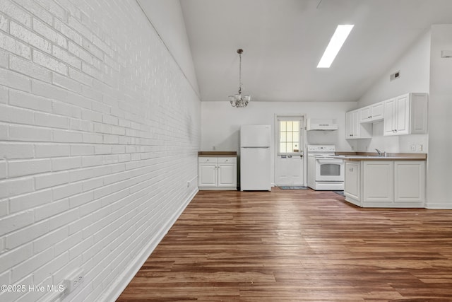 1119 Park St 1117, Elizabeth City, NC 27909 - kitchen with white appliances, brick wall, high vaulted ceiling, dark wood-type flooring, and under cabinet range hood